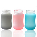 New arrival funny wide neck glass feeding baby bottle with temperature sensitive silicone sleeve